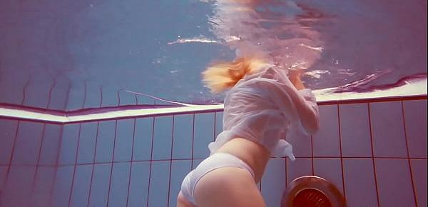  Hot babe Melisa Darkova dressed underwater